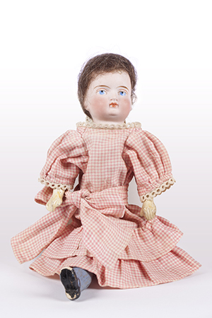 Doll, with startling blue eyes and finely modelled and painted bisque head, belonging to Kathleen Rouse (1878–1932)
