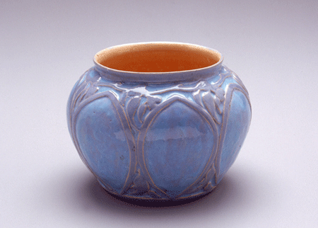 Fig. 3. Earthenware vase with pale blue and mauve glaze and carved gum leaves design, 1929
    by Violet Mace, Boswell, Tasmania
    Powerhouse Museum
  