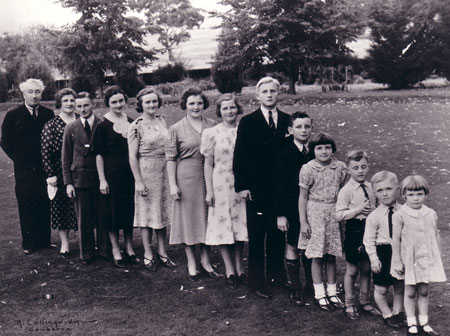 The Lyons family lined up at the Canberra Lodge, about 1938 