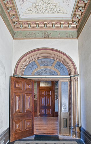 Entrance hall towards the vestibule, Villa Alba, showing the frieze of ‘putti’ playing football and cricket