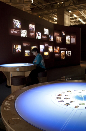Photograph of the interactive touch-screen tables, in which content created by the young participants is embedded